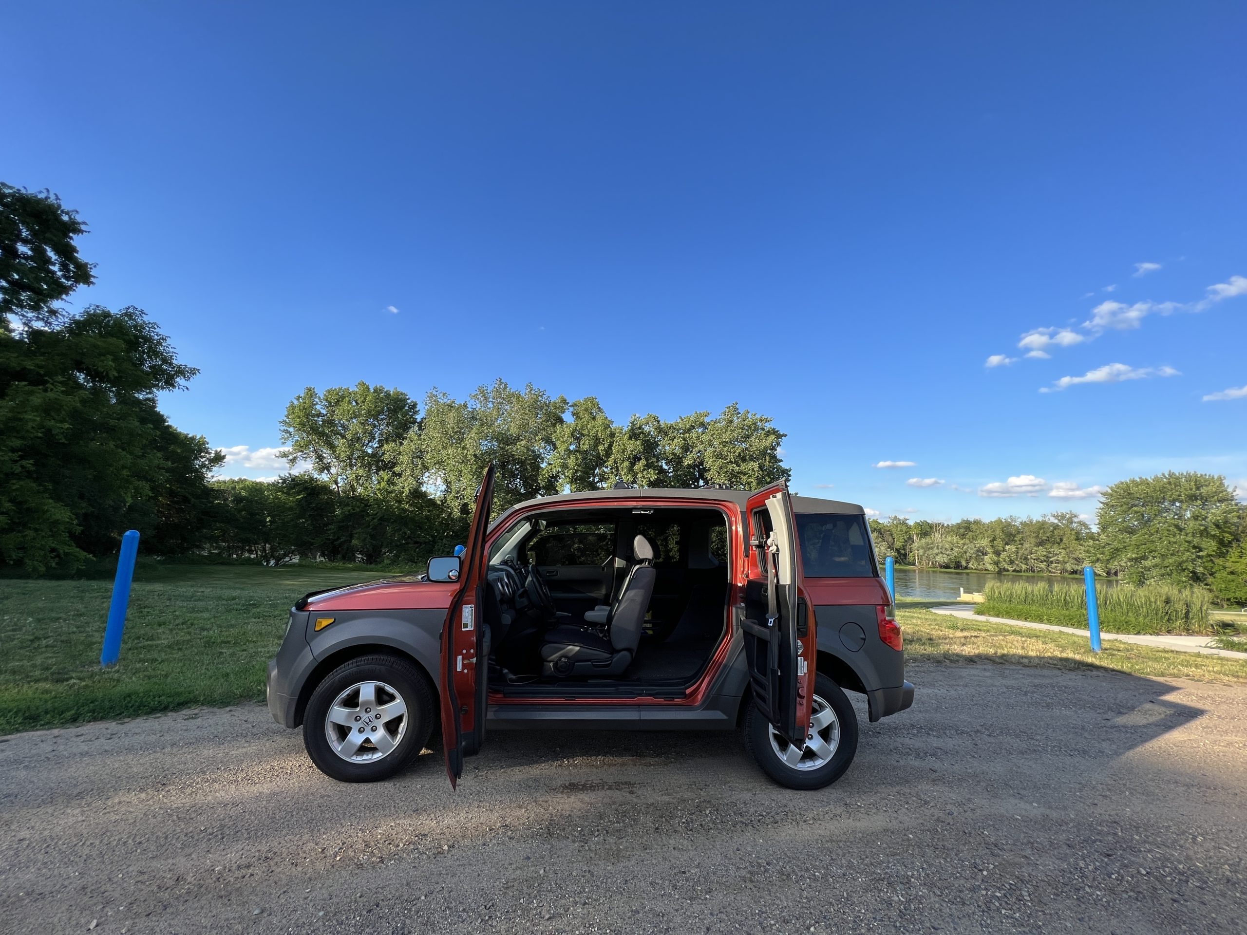 Orange Honda Element with Doors Open