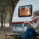 woman Staying warm in a small camper